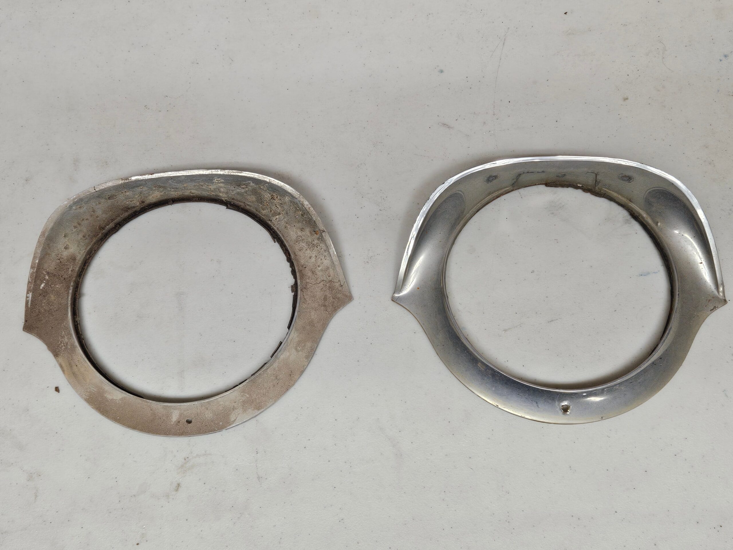 1954-1955 Cadillac 5941973 Headlight Trim Bezels Pair Original OEM