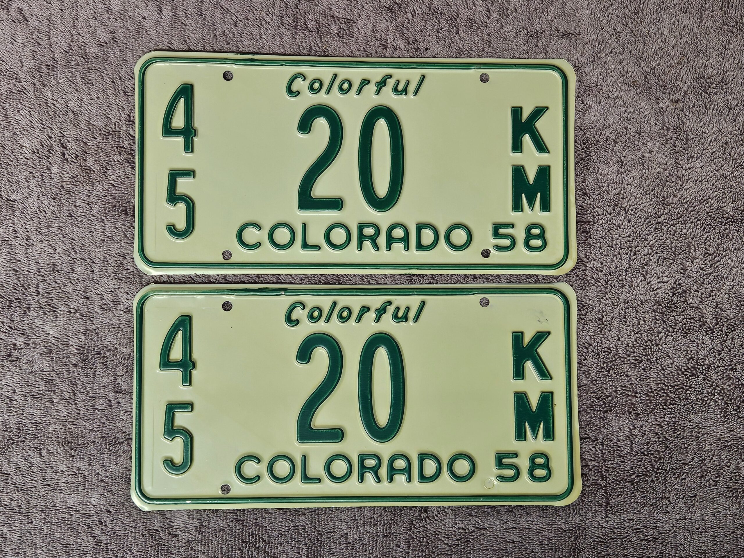 1958 Colorado License Plate Pair #20 KM Low Number Original NOS